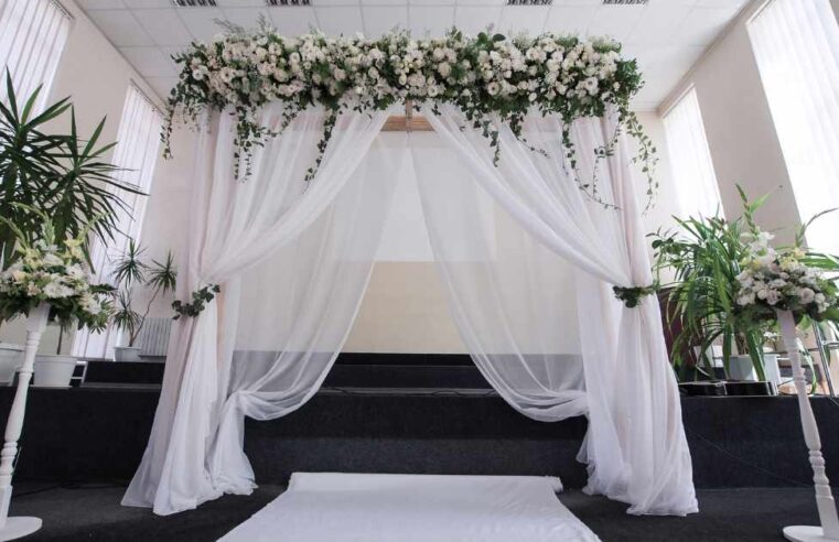 Learn How To Decorate A Wedding Arch With Fabric